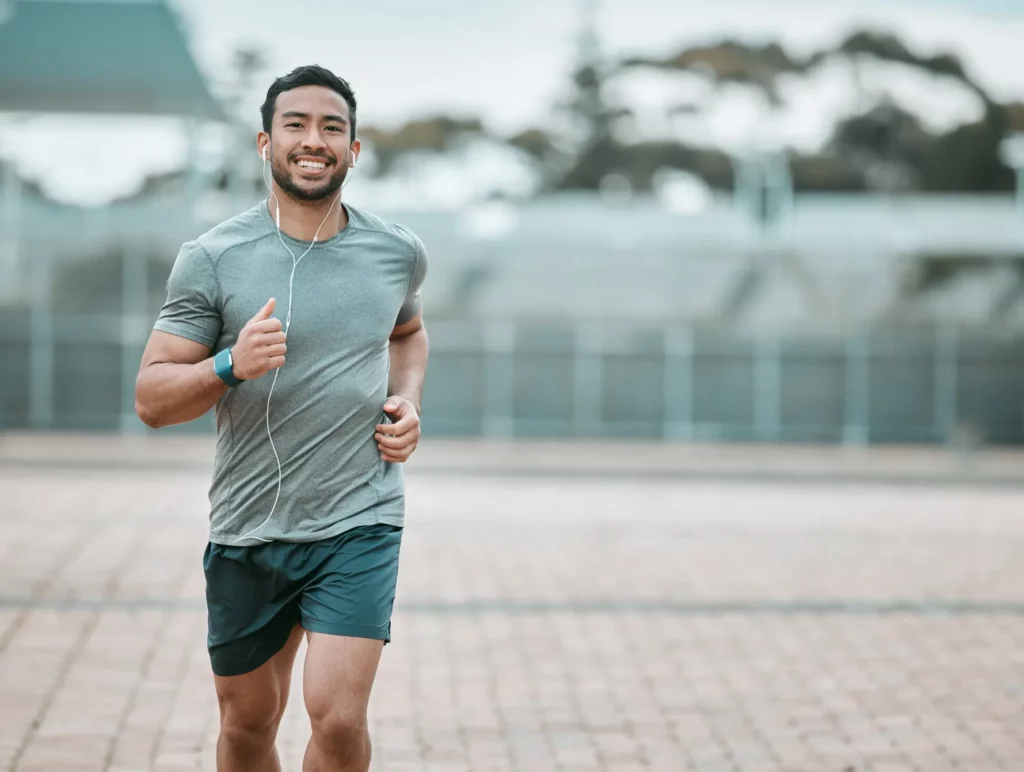 Portfolio 8 Fit man in casual clothing standing confidently, promoting men’s testosterone therapy at Evolve HRT & Wellness in The Woodlands, TX